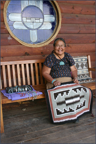 Navajo woman selling rugs and jewelry. Photo by Joyce Alexander; copyright Crow Canyon Archaeological Center.